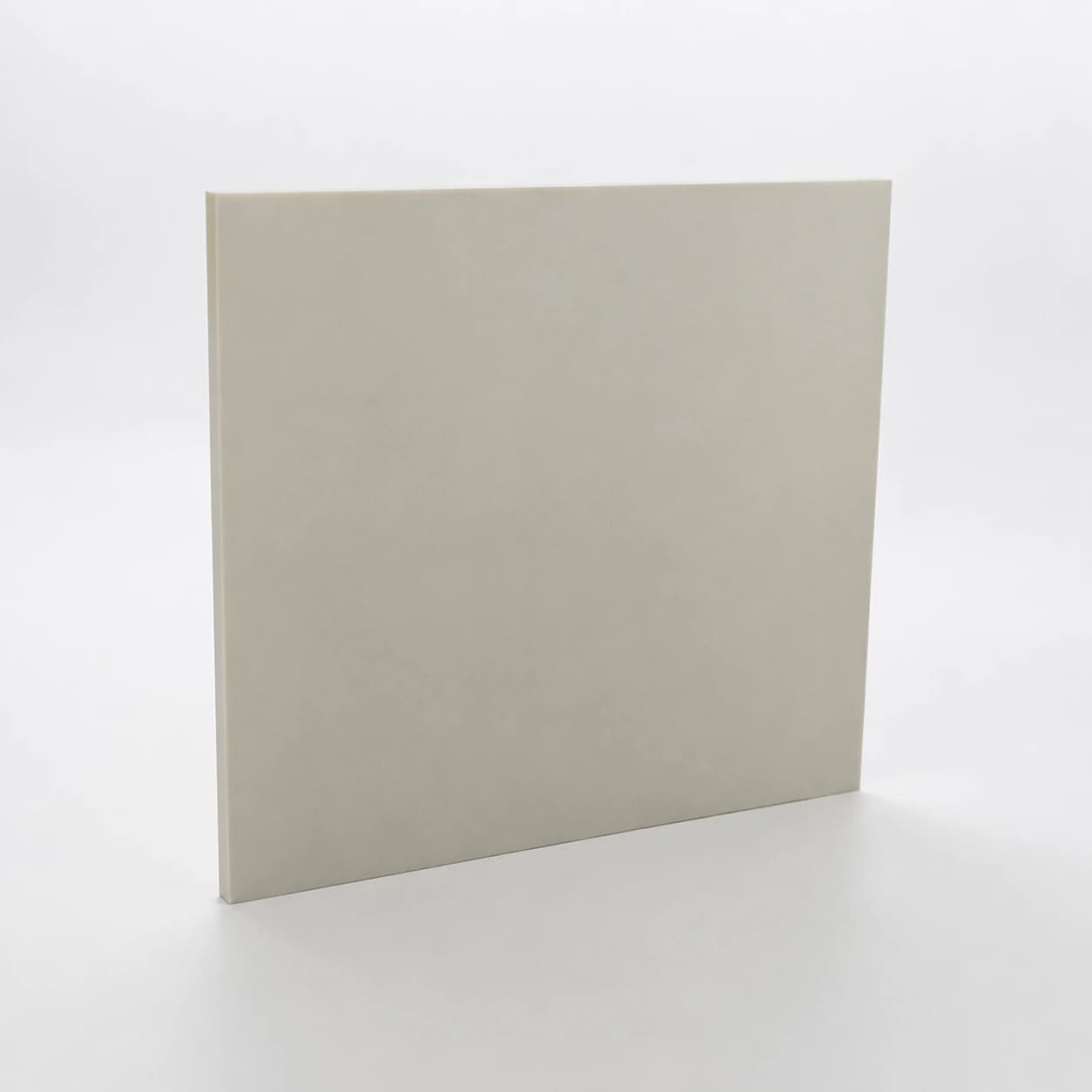 White ceramic substrate plate presented upright on a neutral background