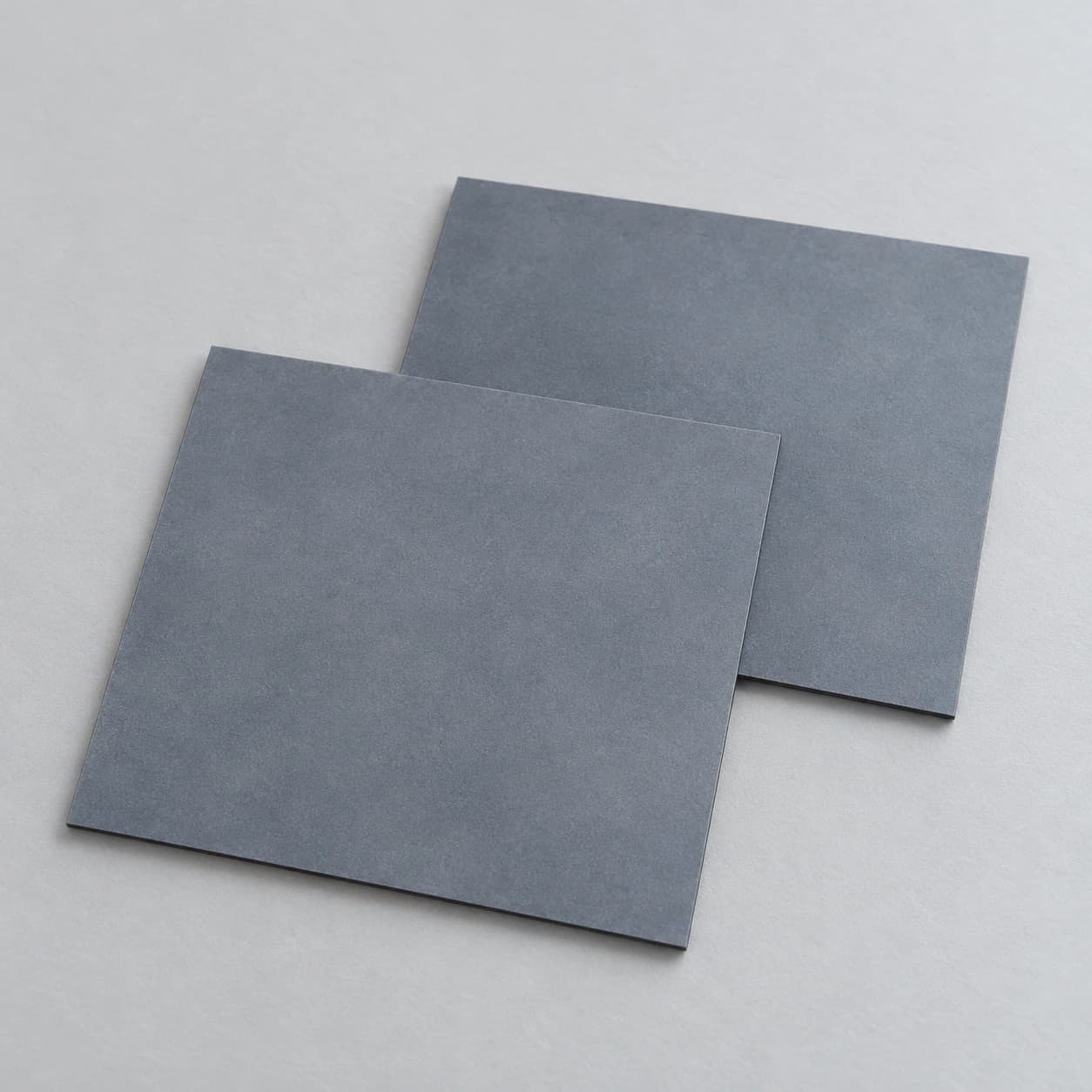 AI-generated concept of two plain thin silicon carbide square plates