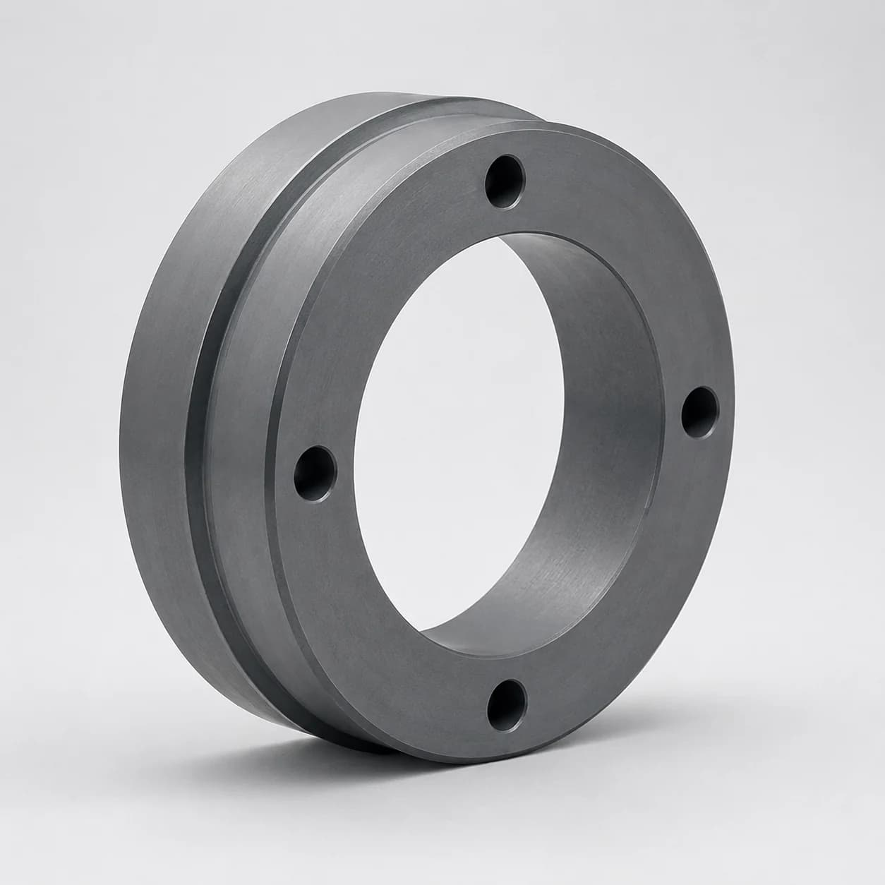 Precision silicon carbide mechanical seal ring with mounting holes shown in a three-quarter view