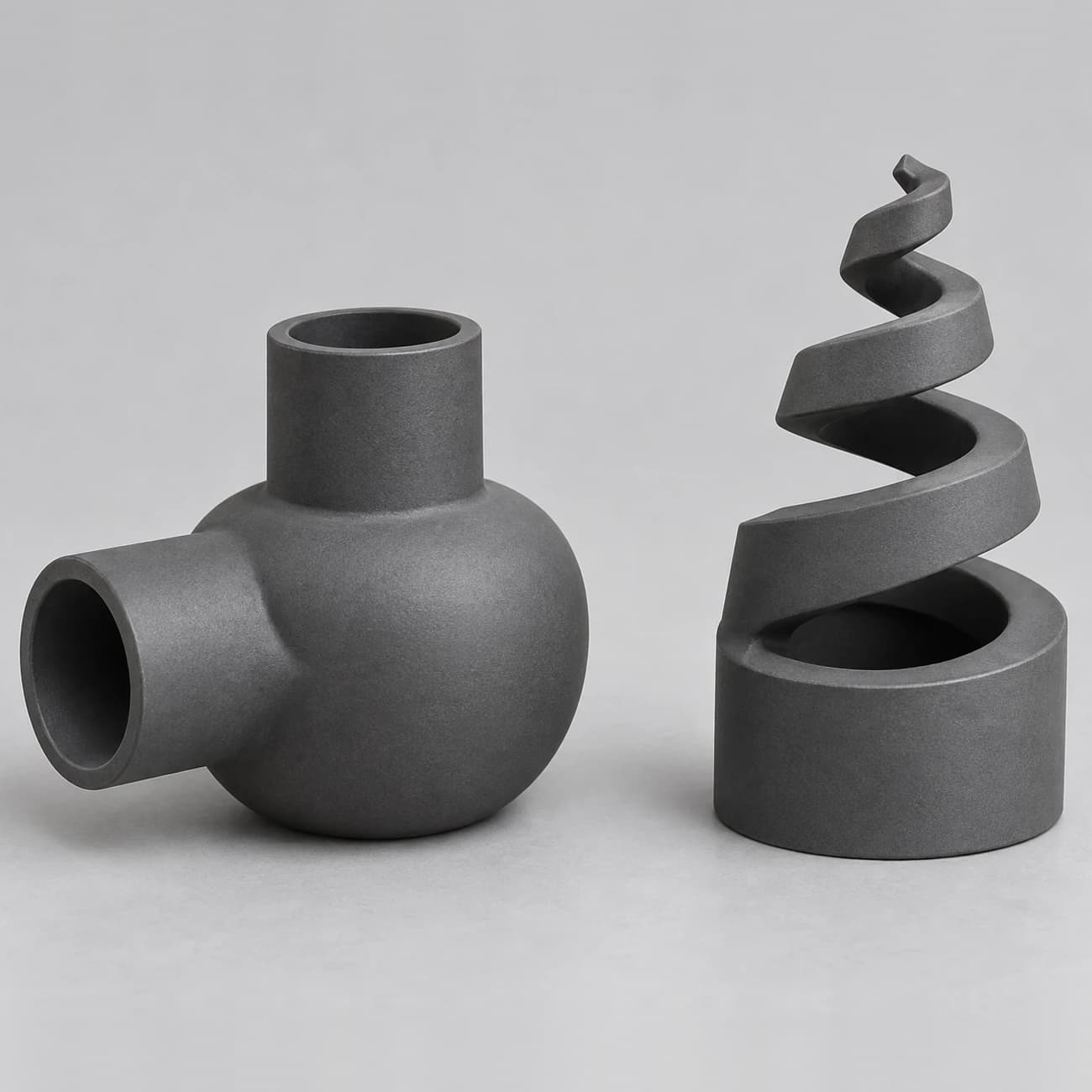 Conceptual FGD spray-nozzle family with a swirl-chamber form and open spiral form