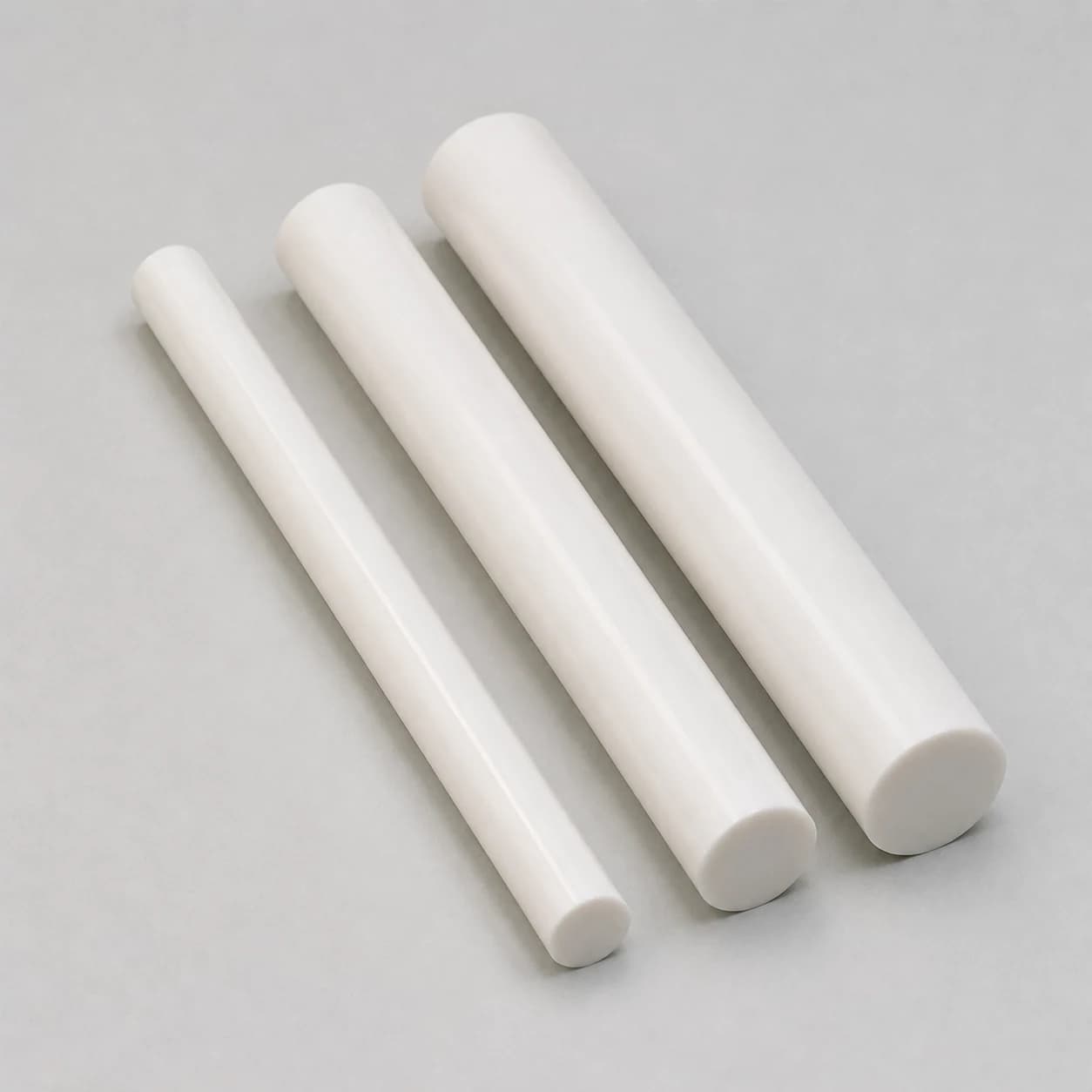 Three solid alumina ceramic shafts in different diameters