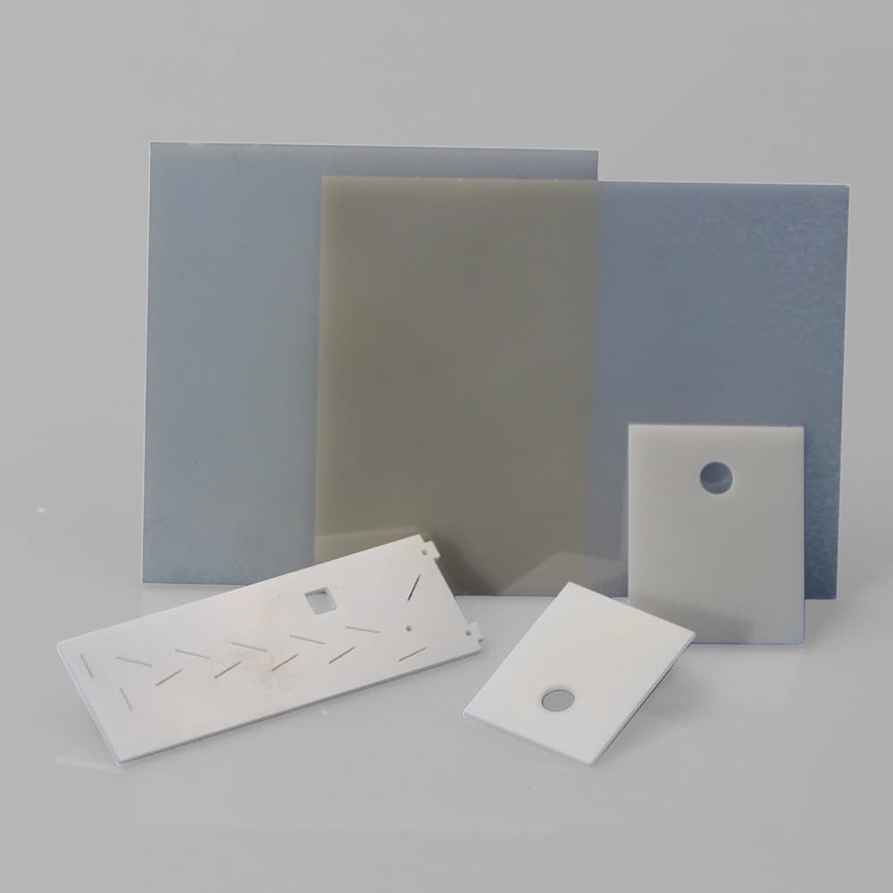 Machined AlN ceramic substrates with holes, slots and cut-outs
