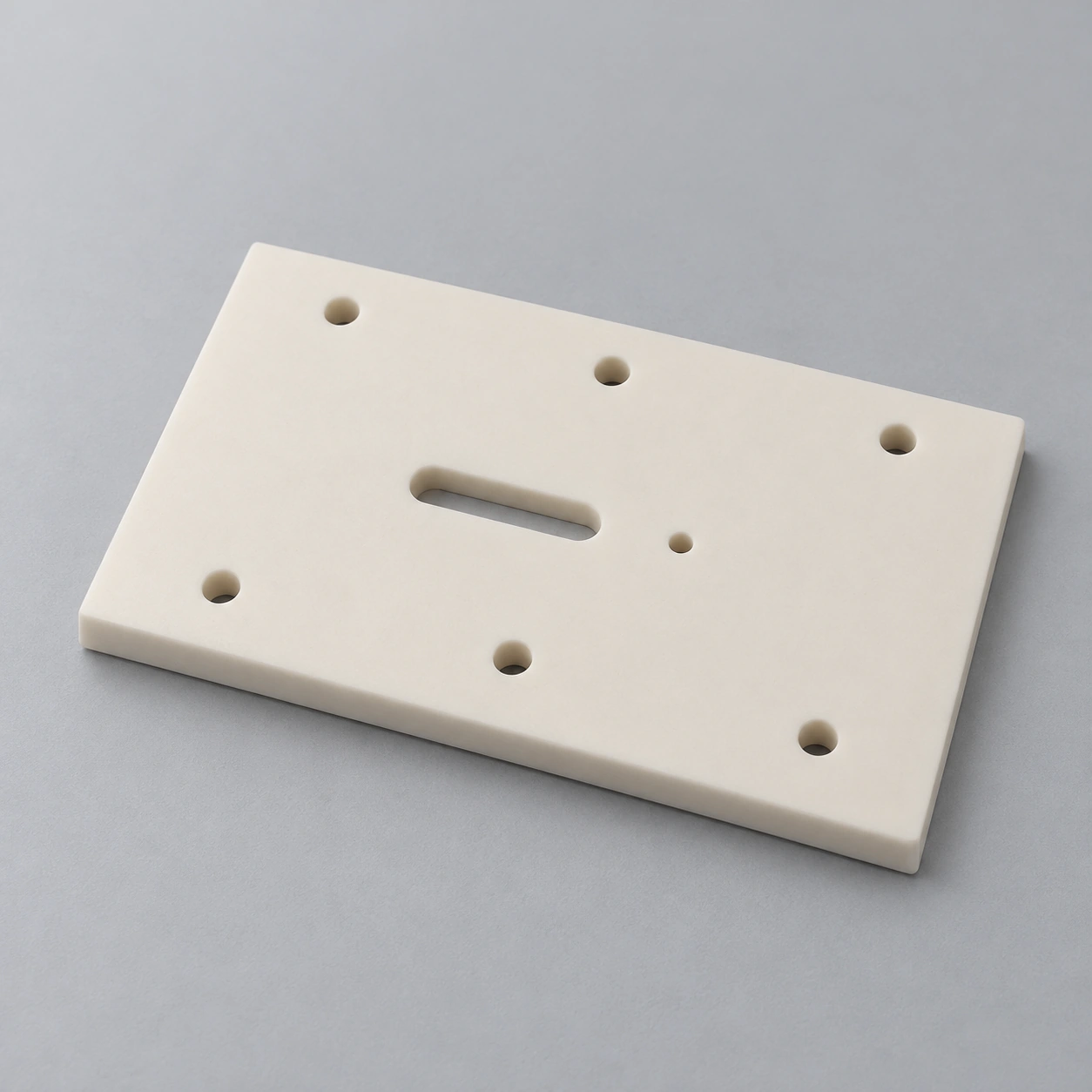 AI-generated concept of an alumina rectangular plate with seven round holes and one oblong slot