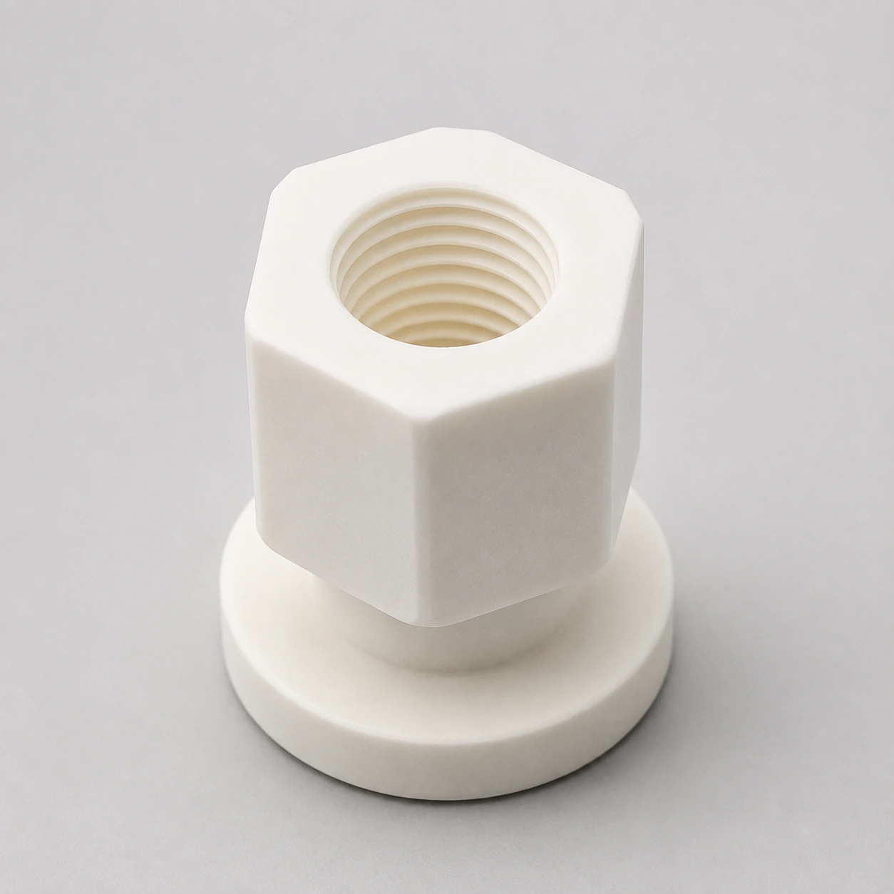 Upright alumina custom component with internal thread, hexagonal body and flange