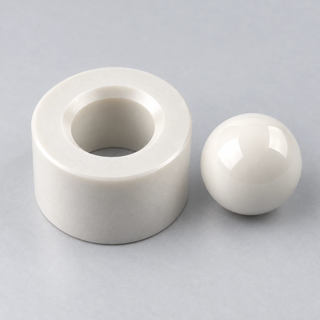 Oblique view of a ceramic valve seat bore and seating chamfer