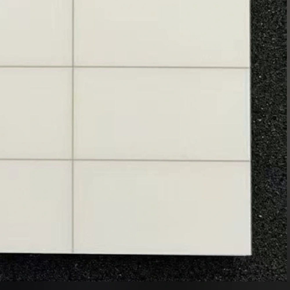 Detail view of alumina ceramic panel with laser-scribed separation lines