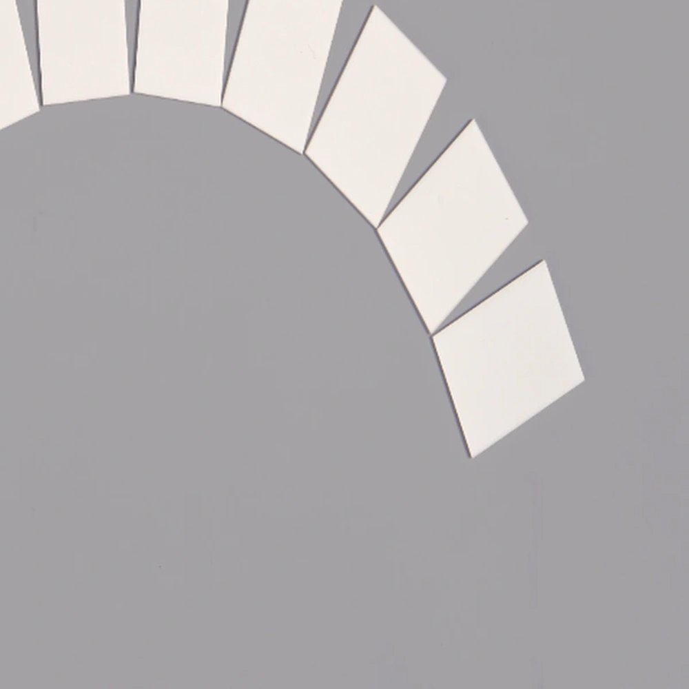Detail view of bare alumina ceramic substrate plates