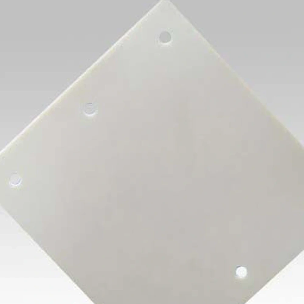 Detail view of aluminum nitride ceramic substrate with drilled holes