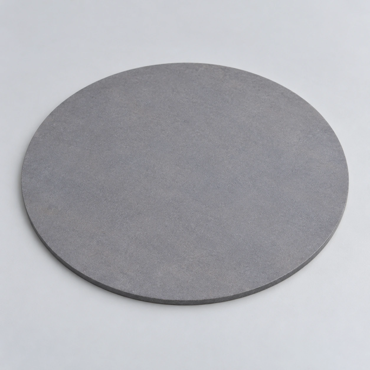 AI-generated concept of a plain circular silicon carbide kiln shelf