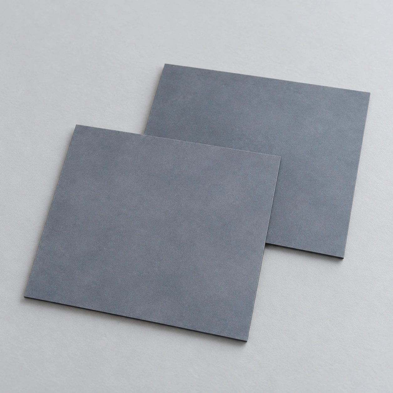 AI-generated concept of two plain thin silicon carbide square plates