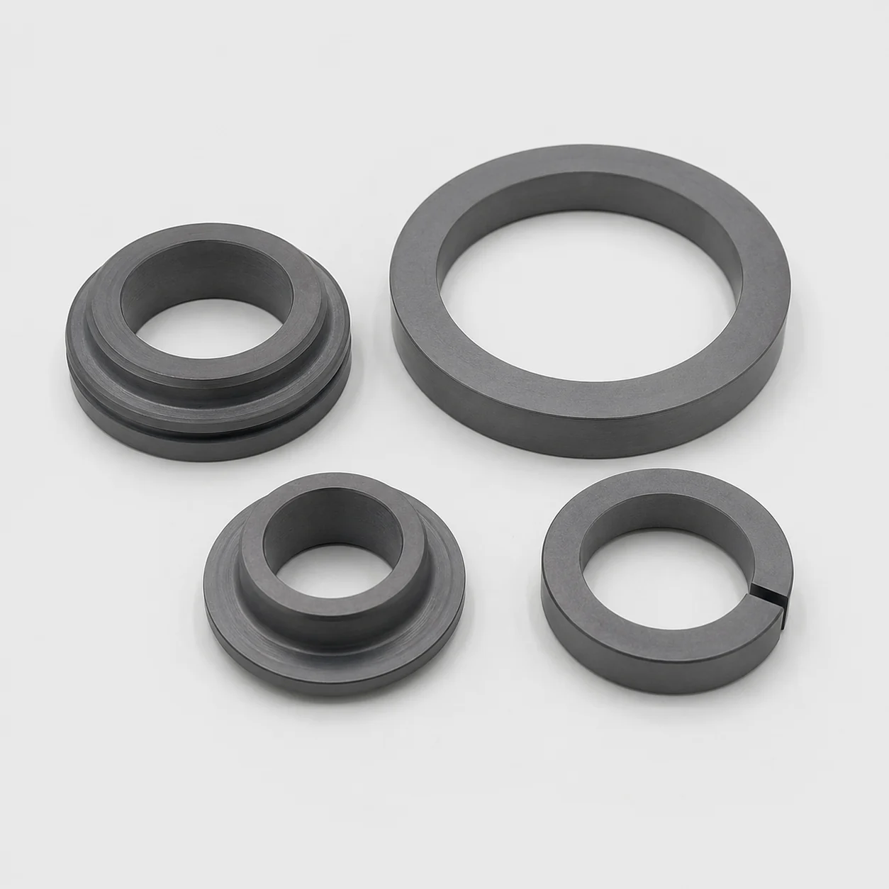 Four silicon carbide mechanical seal rings with stepped and split profiles