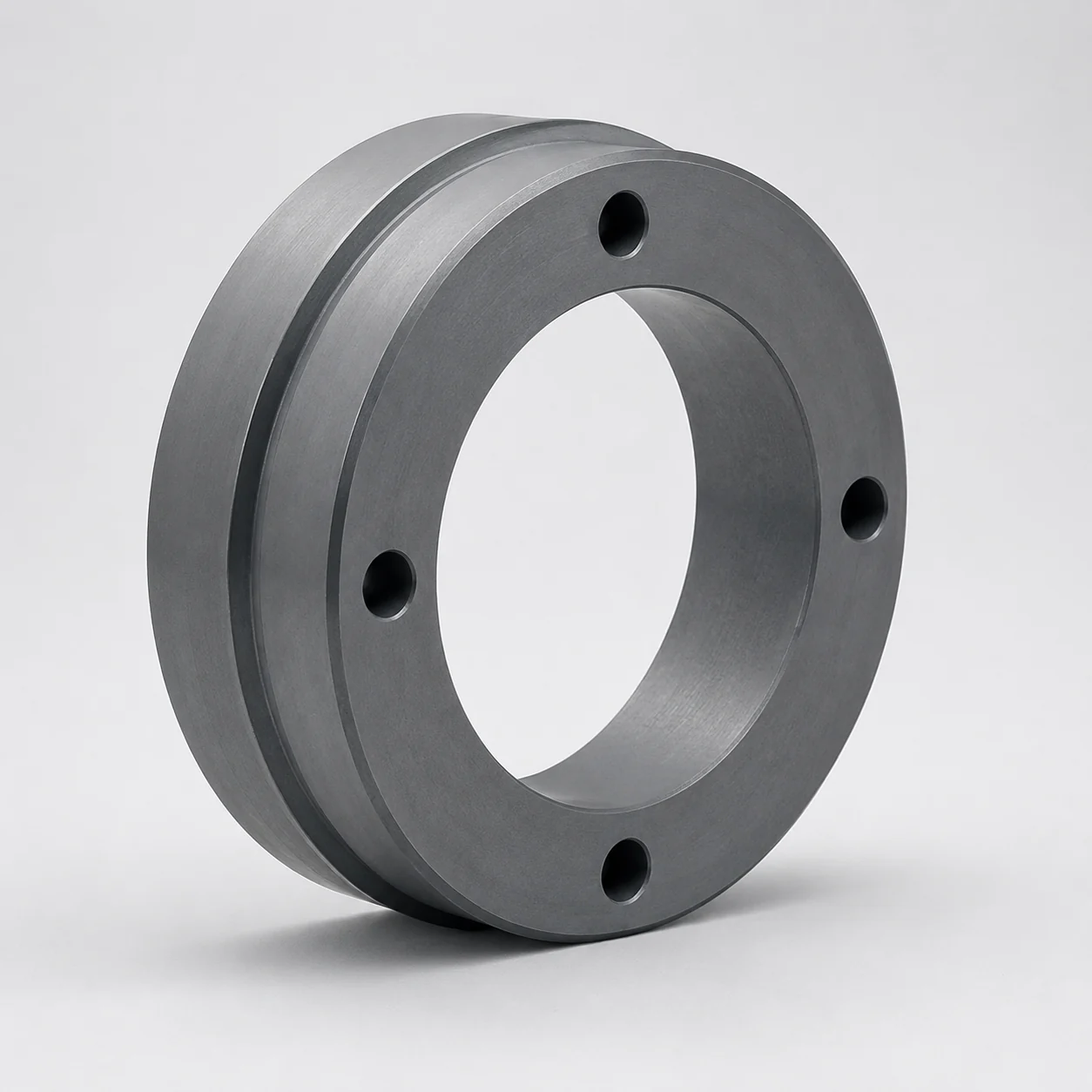 Precision silicon carbide mechanical seal ring with mounting holes shown in a three-quarter view