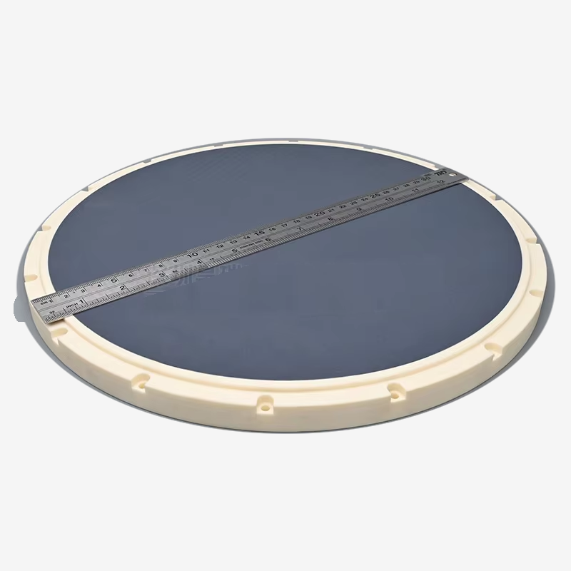 Angled view of a vacuum chuck with a ruler