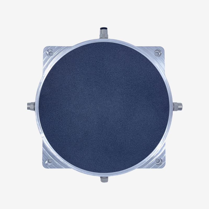 Vacuum chuck assembly with metal housing and connections