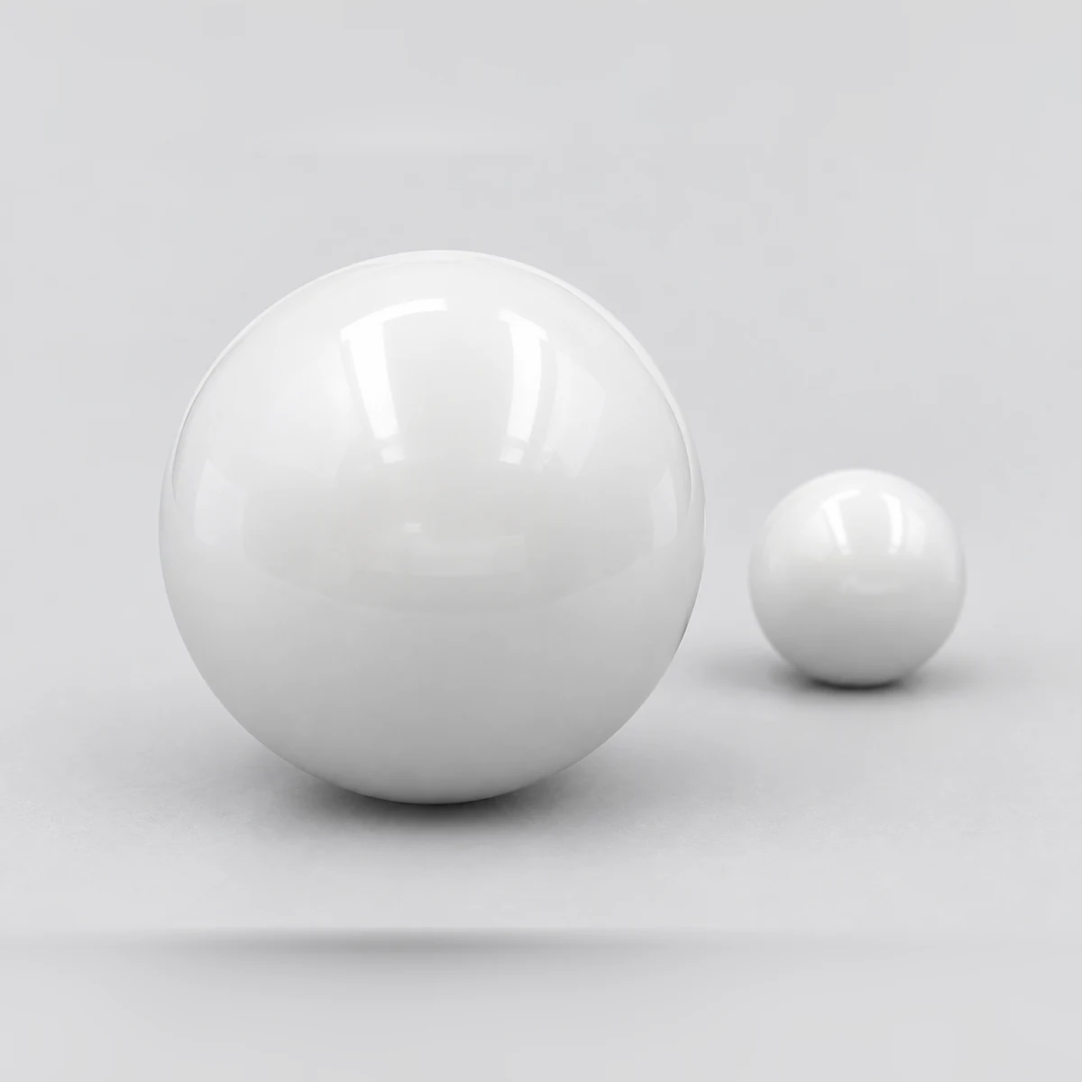 Close-up of two polished zirconia valve balls